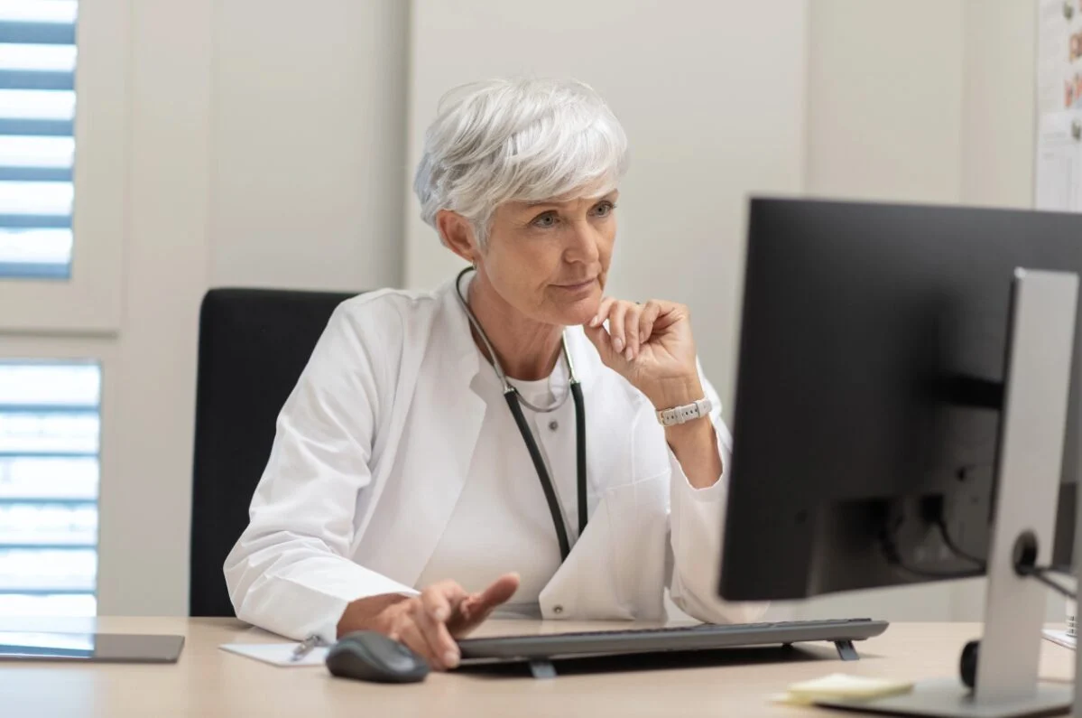 Doctor assessing test results